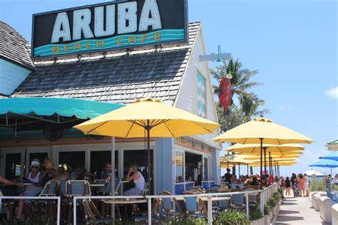 Aruba beach cafe florida - As far as bars go, Aruba Beach Cafe is quintessential South Florida livin'. It hasn't really changed much since it opened in 1983. Both tourists and locals frequent this classically Floridian (read: pastel-colored), upbeat eatery located on the water next to the Commercial Boulevard Pier. In addition to a menu of delectable seafood entrees, two bars offer fruity cocktails, serious …